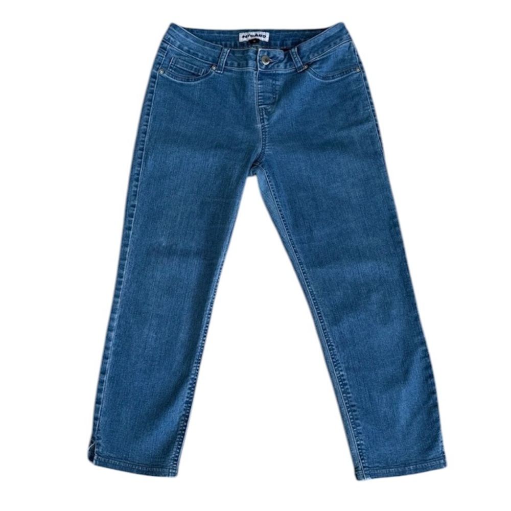 Nygard pull on medium wash stretch denim capris with side slits. Women's size 10